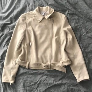 Zip up jacket that is suede material.